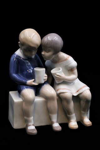 Bing & Grondahl porcelain figure of little boy and girl drinking milk.