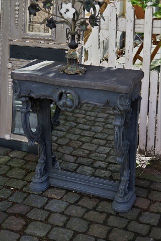 Old French wall console with carved decorations and old original mirror glass...