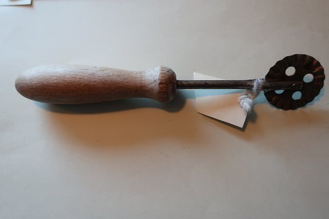 An antique tool for making the danish "klejner" (cakes)
Made of metal with a handle made of wood