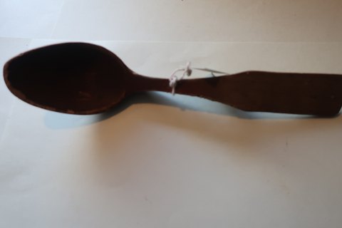 An old spoon made of wood