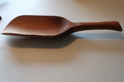 An old spoon made of wood  from the old grocer