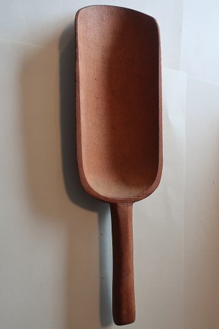 An old spoon made of wood  from the old grocer
