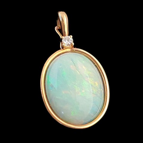 C. Antonsen; A pendant with an opal and a diamond mounted in 14k gold