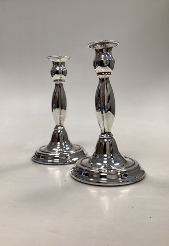 Pair of Silver Candlesticks