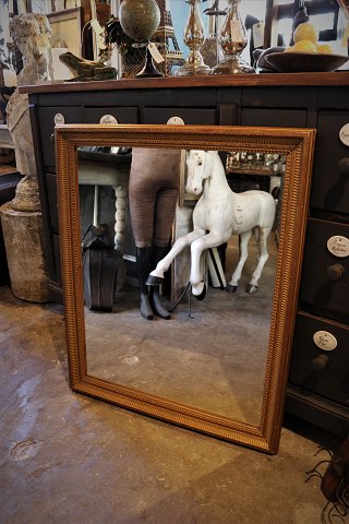 Antique, French 19th century mirror with fine decorated gold frame with a fine 
patina...