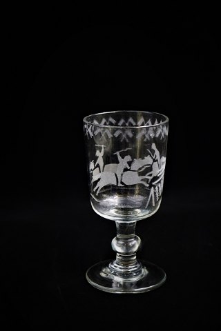 Antique French 19th century mouth-blown wine glass with decorations of a rider 
on a horse...