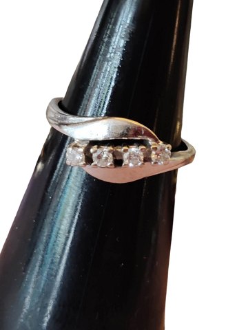14 carat white gold ring with 4 diamonds