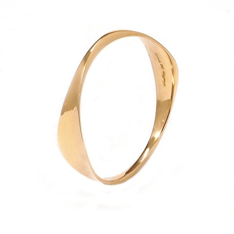 Hans Hansen armring i 14kt guld. Stemplet Hans 
Hansen. D indv.: 6,2cm. V: 31,9gr