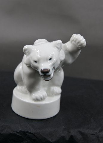 Royal Copenhagen Denmark stoneware Figurine No 333, bear sitting on plinth with lifted left paw