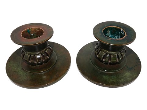 Bronze 
Pair of large low candle light holders from 1920-1930