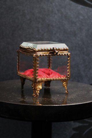 Antique French jewelery box in bronze and faceted glass and silk cushion at the 
bottom...