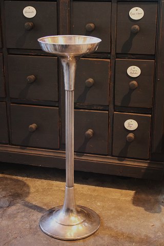 Old French metal stand with room for a champagne cooler/bucket at the top...