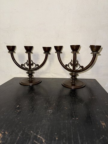 Pair of Art Deco candlesticks in bronze