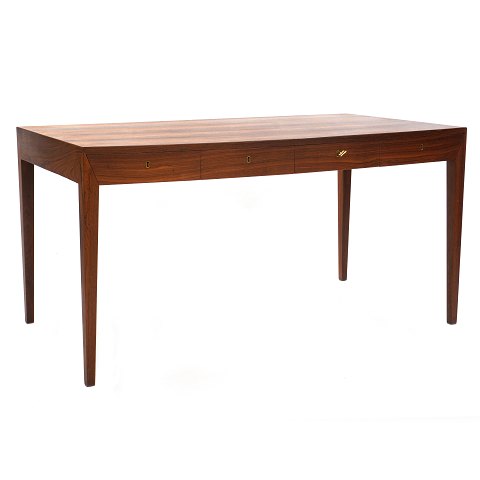 Rosewood veneered writing table by Severin Hansen, 
Denmark. Manufactured by Haslev Møbelsnedkeri. 
Nice condition. H: 74cm. Plate: 75x143cm