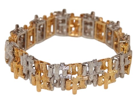Michelsen 18 karat guld 
Kraftigt og bredt brutalisme armbånd af Knud V. Andersen fra 1975-1989