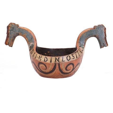 Norwegian early 19th century wood cut drinking 
bowl dated 1803. H: 21cm. L: 41cm