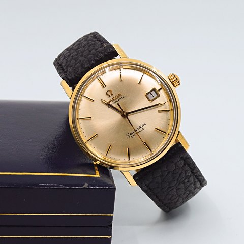 Omega; Seamaster De Ville armbåndsur i stål med guld 1968