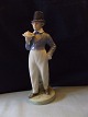 Royal Copenhagen Figurine Boy with Flowers No 1833