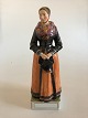 Royal Copenhagen Overglaze Figurine No 12101 Acht Pitter Bacher´s daugther 
Church-going Custume; Amager