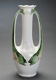 Art Nouveau porcelain vase decorated with two handles in the shape of fish.