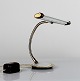 Table lamp in steel and brass.
