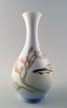 Royal Copenhagen Art Nouveau vase decorated with fish.
