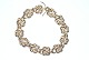 Knot bracelet, 
14 karat gold