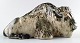 Royal Copenhagen stoneware figurine no. 22604, lying bison.
