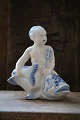 K&Co. presents: Very rare blue fluted figure of boy sitting on the fish ,from Royal Copenhagen.Factory 1st ...