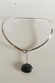 Danam Antik 
presents: 
Georg 
Jensen Sterling 
Silver Torun 
Neckring No 168 
with Pendant No 
129