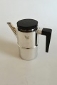 Danam Antik 
presents: 
Georg 
Jensen Sterling 
Silver S.G.J. 
Coffe Pot with 
Wooden Handle 
and Lid No 1143