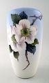 Royal Copenhagen vase decorated with flowers.
