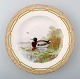 Royal Copenhagen Flora Danica / fauna Danica dinner plate with  motive of a duck 
in landscape.