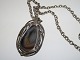 Anette Bord
Large pendant with stone in long chain from 1970-1980