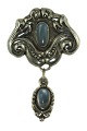 Holger Fischer; An Danish Art Nouveau silver brooch with moonstones