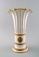 Royal Copenhagen vase with gold decoration. Trumpet-shaped.