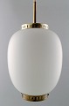 Bent Karlby: "The China light". Danish design.
Pendant in matte opal glass with brass fitting.