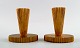 Tinos art deco, a pair of candlesticks in bronze.