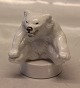 246 Kgl. (1003246) Hvid Isbjørneunge siddende pote mod pote på rund sokkel ca 10 
x 9 cm Knud Kyhn/ Jeanne Grut 22745 (0346) Kongelig Dansk Stentøj 

