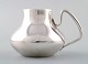 Georg Jensen Cream jug, number 1017.
Henning Koppel (1918-1981) year 1952.