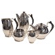 Antik 
Damgaard-
Lauritsen 
presents: 
Hans 
Hansen Coffee 
and tea service 
in silver