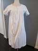 Shift / dress
An old shift with emboidery initials hand made, 
the old linen buttons, gusset in the seam in the 
side etc.
The antique, Danish linen and fustian is our 
speciality and we always have a large choice of 
shifts, babydress etc.