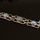 Silver bracelet with moonstones. Signed A.H.W. L: 19cm