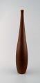 Jacob Siv for Syco, Strömstad, Swedish ceramist.
Large beautiful ceramic vase with narrow neck, glaze in brown shades.