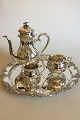 Coffee set in Silver Plater and round Art Nouveau packet in Nickel Silver with 
grape decoration. Coffee pot, Sugar Bowl and Creamer.