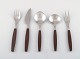 Stainless steel STRATA, HENNING KOPPEL cutlery, brown plastic. Manufactured by 
Georg Jensen.