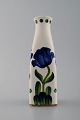 Aluminia faience vase, hand-painted with floral motifs.
