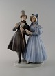 Large Royal Copenhagen figurine, "Evening walk in Tivoli gardens".