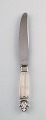 Five Georg Jensen Acanthus Sterling Silver, dinner knifes with short handle.