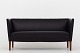 Roxy Klassik 
presents: 
Grete Jalk 
/ Snedkermester 
Johannes Hansen
2-seater sofa 
in black 
leather and 
legs in ...